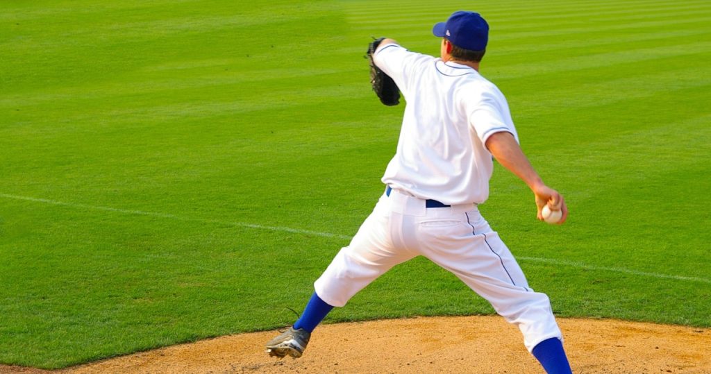 young man playing baseball